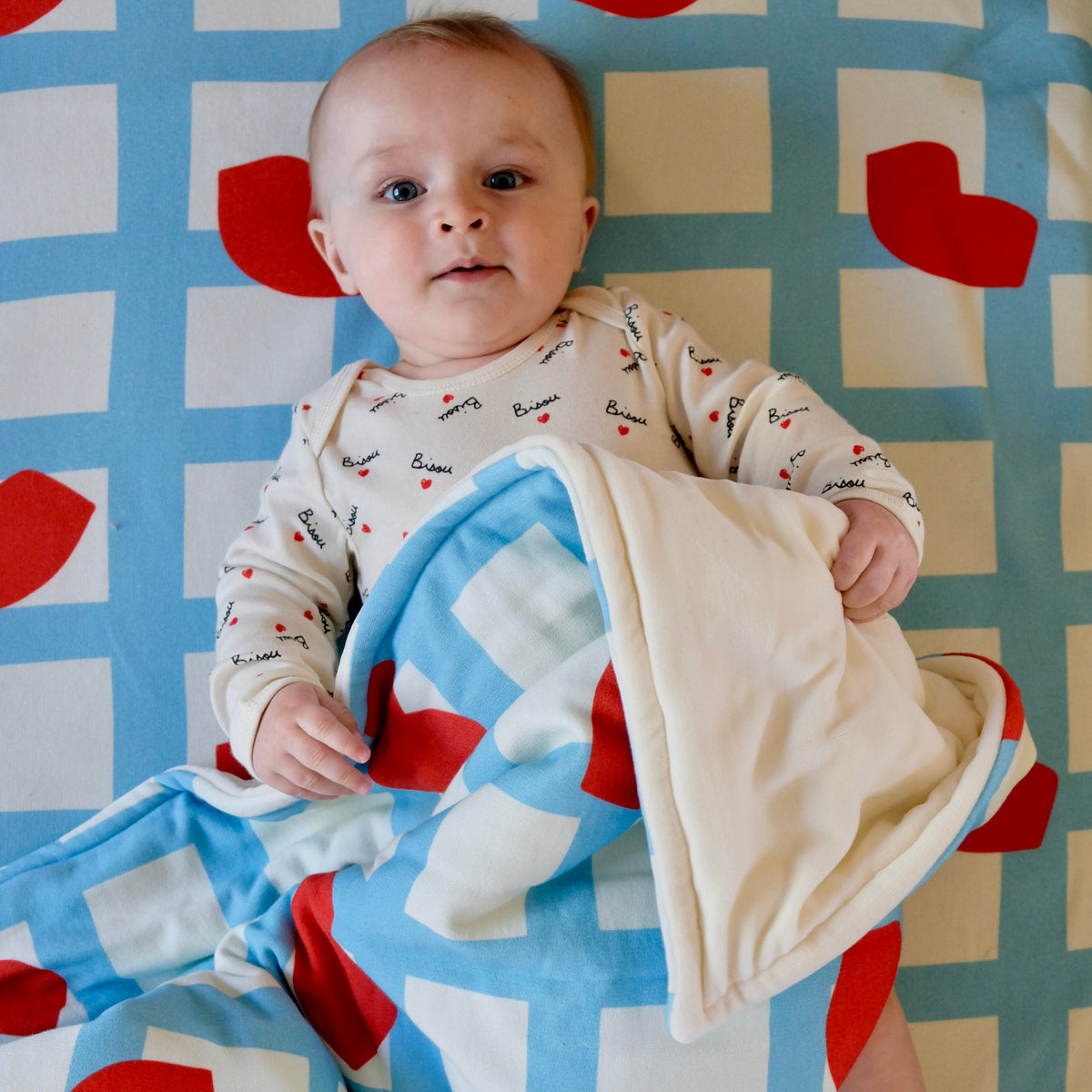 cosy fleece-effect blanket collab Mathilde Cabanas kisses lips print 