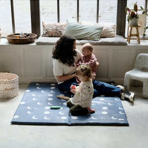 waterproof cover for baby and toddler activity and motor skills play mat 
waterproof printed lune to the moon and back

